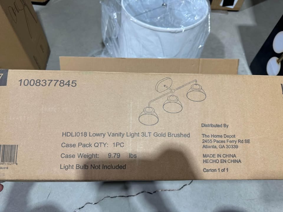 Lowry 30 in. 3-Light Brushed Gold Vanity Light with Glass Shades
